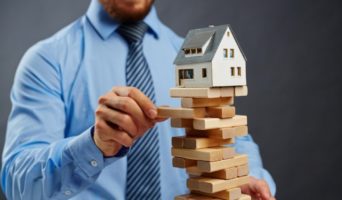 Можно ли получит ипотеку с непогашенными кредитами?